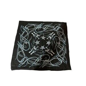 black scarf with a decorative chain and star pattern